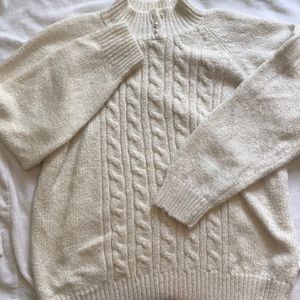 A cream comfortable sweater